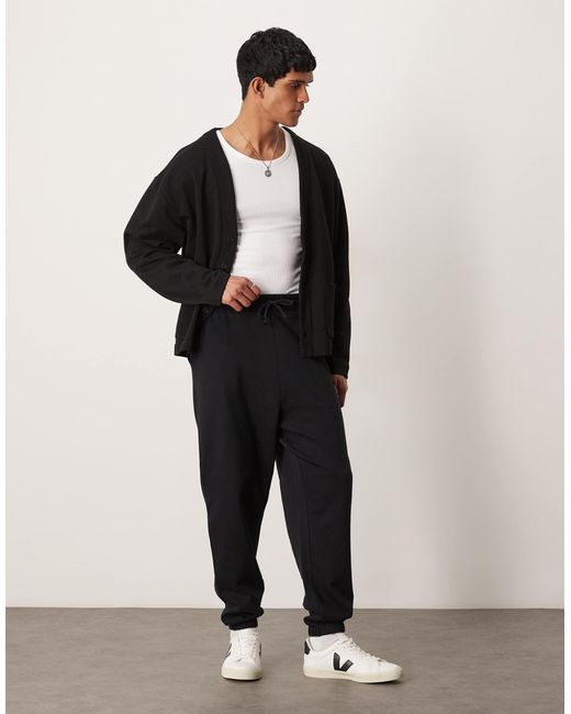 ASOS – essentials – oversize-jogginghose in Black für Herren