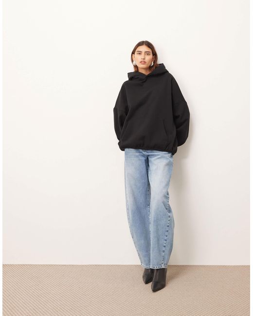 Sweat à capuche oversize épais ARRANGE en coloris Black