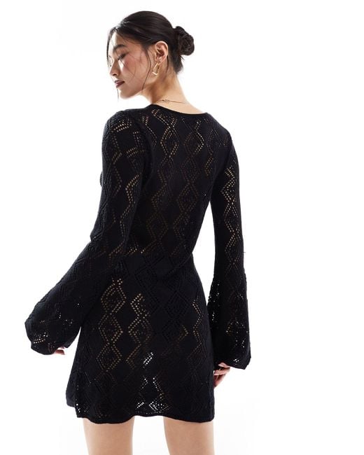 In The Style Black Knitted Crochet Long Sleeve Beach Mini Dress