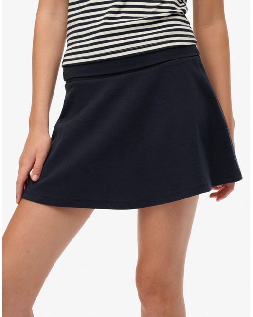 Athletic essentials - jupe à taille rabattue - éclipse Superdry en coloris Blue