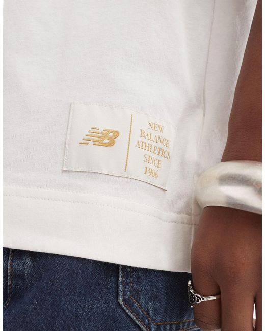 Camiseta hueso sportswear greatest hits New Balance de color White