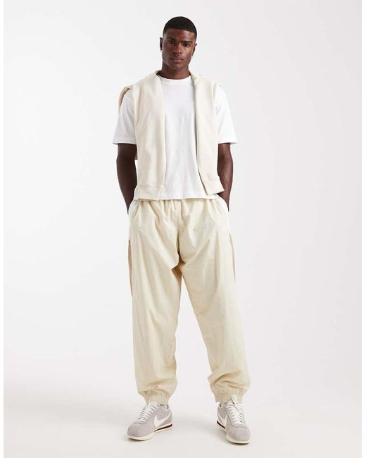 Nike Natural Club Woven Tracksuit Bottoms for men