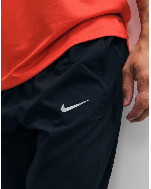 Nike White Miler Dri-Fit Woven Joggers for men