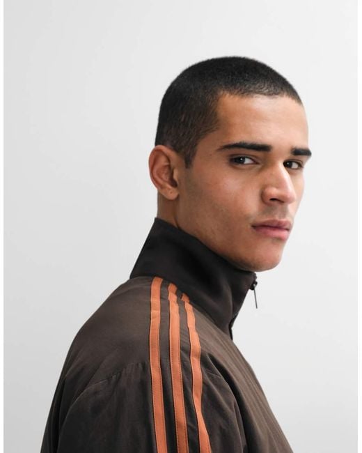 Adidas Originals Black Firebird Woven Track Top for men