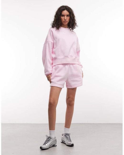Phoenix di Nike in Pink
