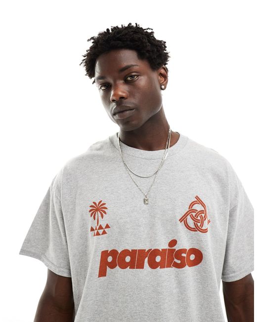 T-shirt oversize avec imprimé paraiso sur le devant - chiné ASOS pour homme en coloris White