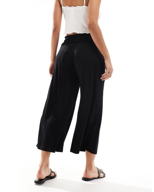 Jupe-culotte courte avec taille froncée ASOS en coloris Black