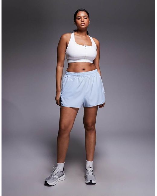 4505 Blue Curve Icon Woven Run Short With Zip Pockets