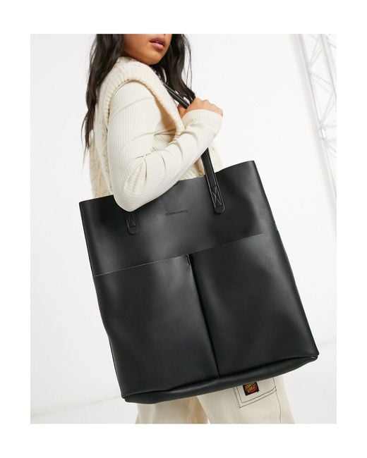 Claudia Canova Black Unlined Two Pocket Tote Bag With Removable Pouch