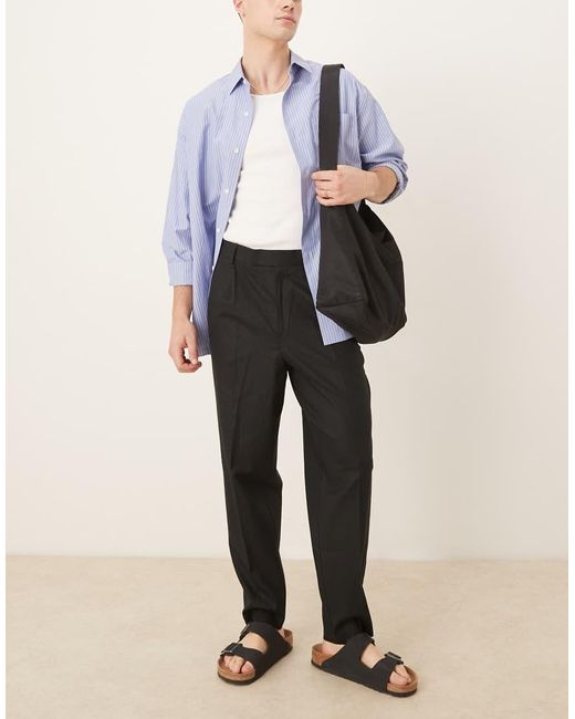 Pantalones De Vestir Negros De Corte Tapered Holgado Con Pinzas Delanteras De Mezcla De Lino De ASOS de hombre de color Black