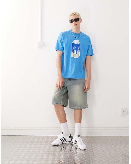 Camiseta De Corte Skater Con Estampado Gráfico De Leche De Collusion de hombre de color Blue