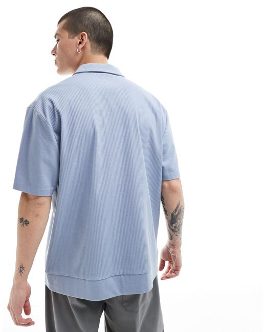 Camicia polo comoda vestibilità comoda con bottoni di ASOS in Blue da Uomo