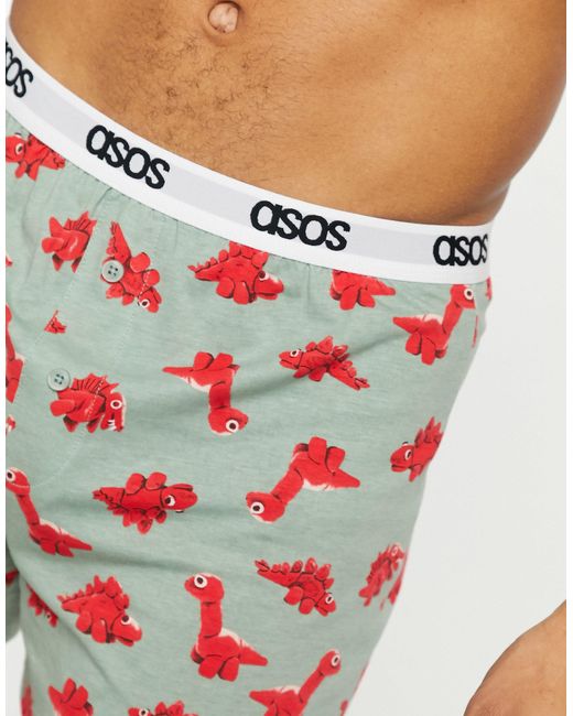 ASOS – boxershorts mit cartoon-dinosaurier-print in Green für Herren
