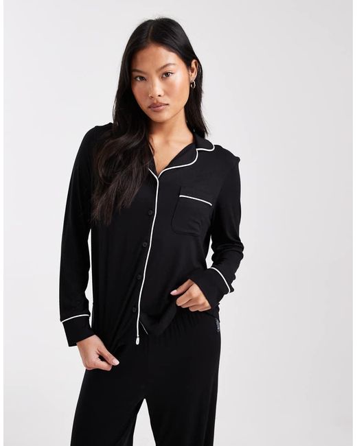 ASOS Black Asos Design Petite Super Soft Long Sleeve Shirt & Pants Pyjama Set With Contrast Piping