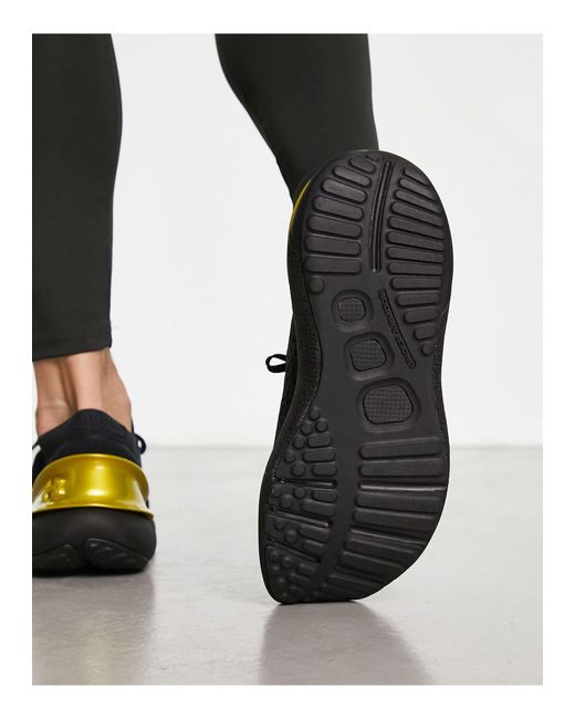 under armour hovr phantom black gold