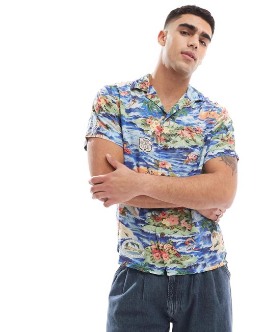 Polo Ralph Lauren – kurzärmliges, mehrfarbiges hemd aus rayon mit reverskragen, klassischer passform und surf-landschaftsprint in Blue für Herren