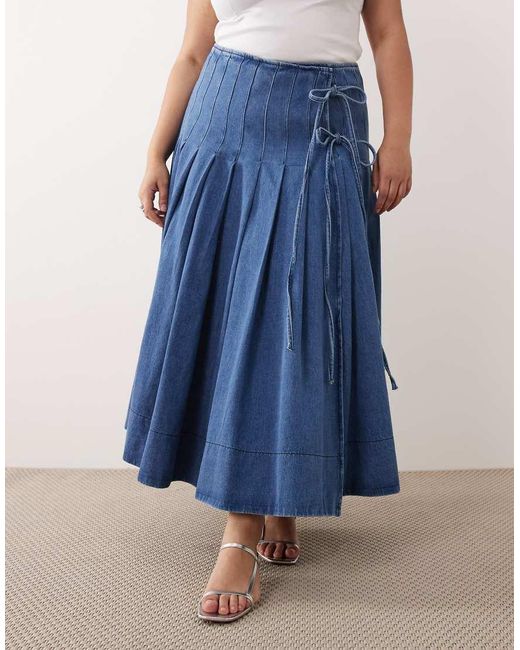 ARRANGE Blue Curve Pleated Denim Midi Skirt With Tie Detail