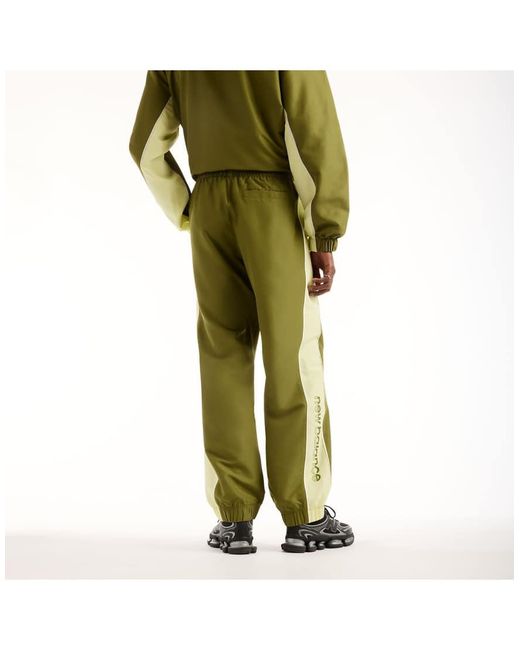 New Balance Green Trackside Woven Pant for men