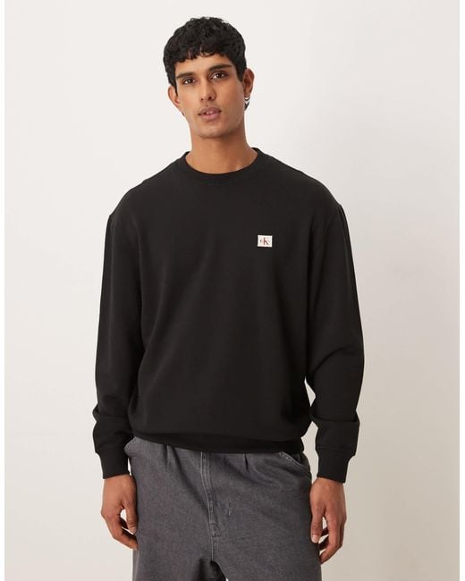 Calvin Klein Black Small Badge Logo Sweatshirt for men