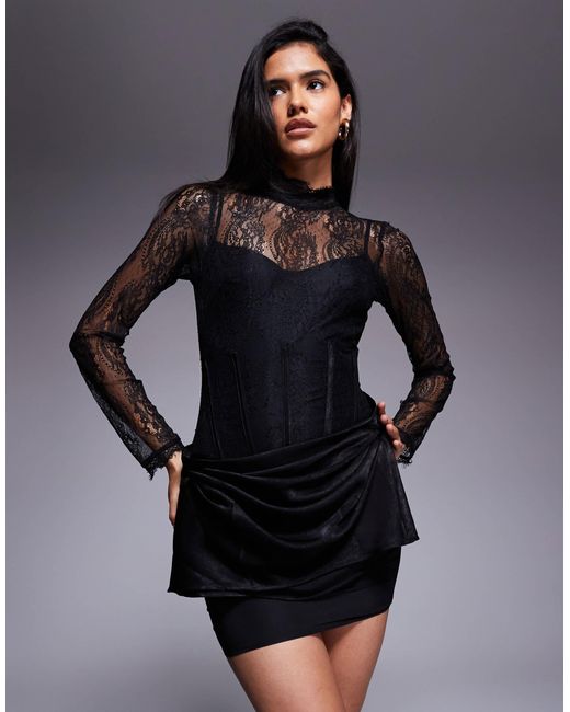 Robe courte à col montant et manches longues en dentelle avec jupe à superposition drapée ASOS en coloris Black