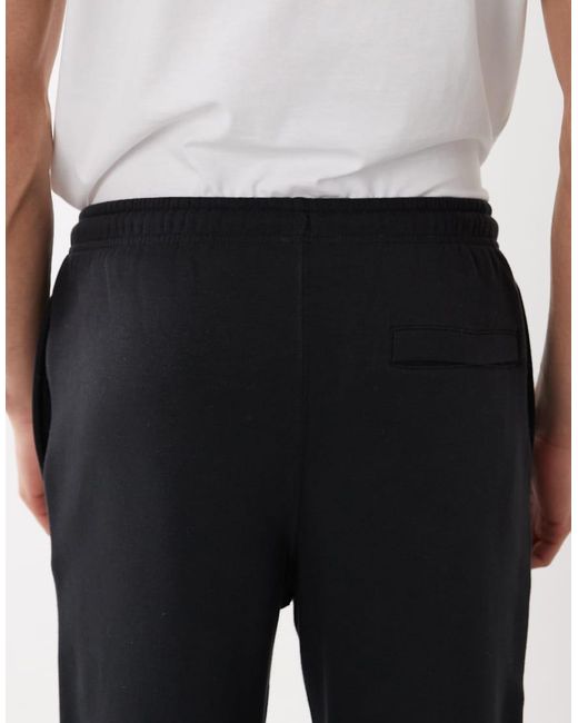 Nike White Club Fleece Straight Leg Logo joggers for men