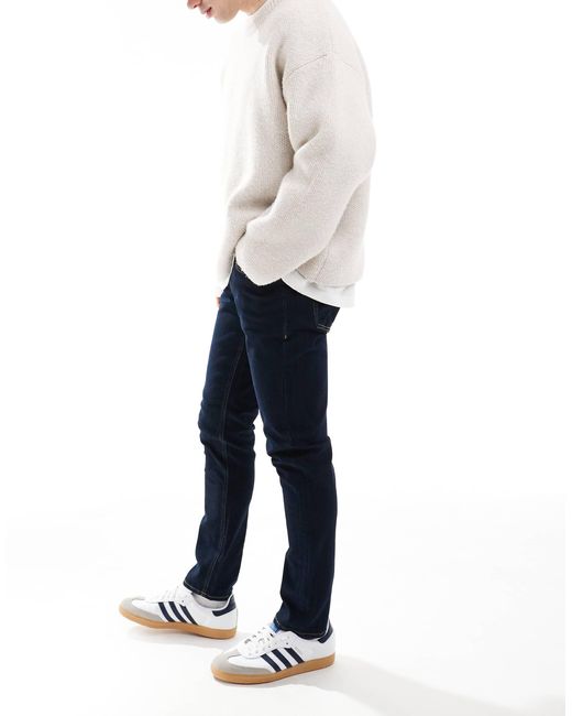 Luke - jean slim - indigo foncé JJ Rebel pour homme en coloris White