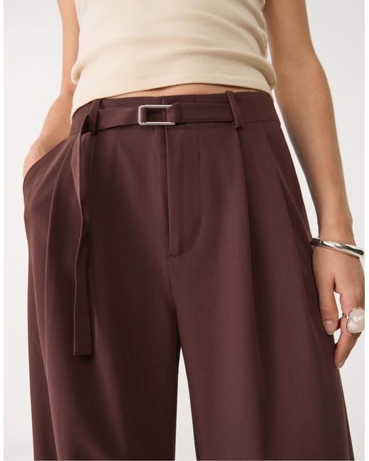 Pantalon ample et habillé avec boucle Stradivarius en coloris Brown