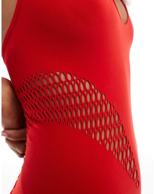 The Kript Red Super Stretch Halter Catsuit With Cut Out Detail