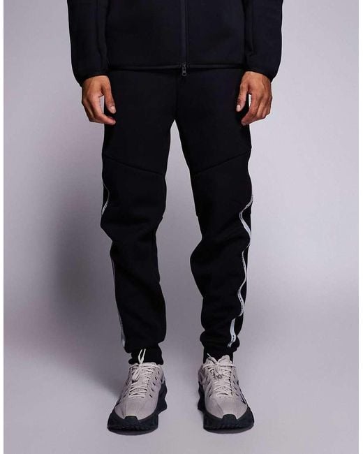 Nike Blue Tech Fleece Reflective Joggers for men