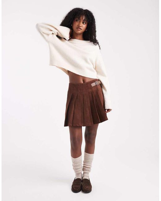 Knit & Suede Mini Skirt With Fringe and Gold Buckle Details