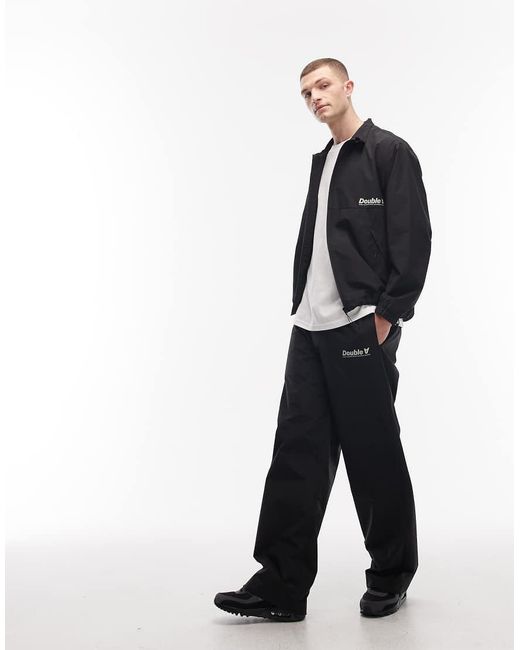 DOUBLE A by WOOD WOOD Black Robert Logo Shell Tracksuit Trousers Co-ord for men