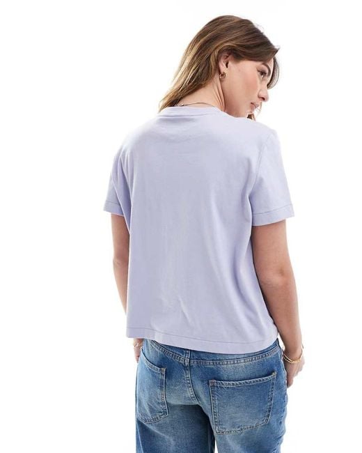 Camiseta Color Lavanda Con Logo De Texto En La Parte Central Del Pecho De -Morado Calvin Klein de color White