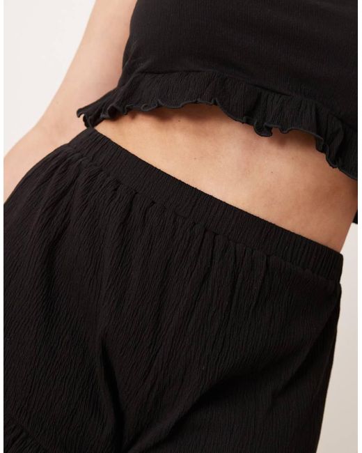 Pantalones Cortos Negros Con Vuelo De Tejido Efecto Rugoso De Asos Design Curve (Parte De Un Conjunto) ASOS de color Black