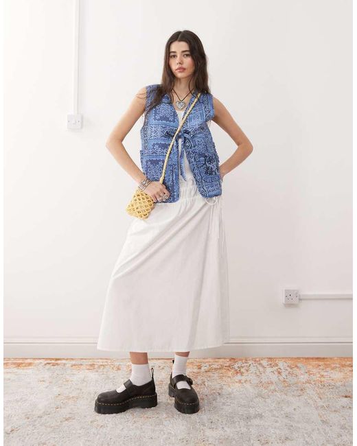 Reclaimed (vintage) Omkeerbare Gewatteerde Bodywarmer Met Print En Gestrikte Voorkant in het Blue