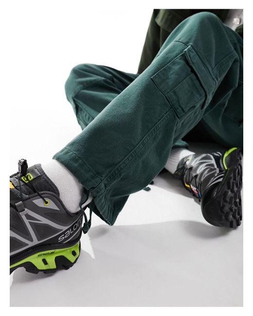 Pantaloni cargo verdi con tasche di Guess in Green da Uomo