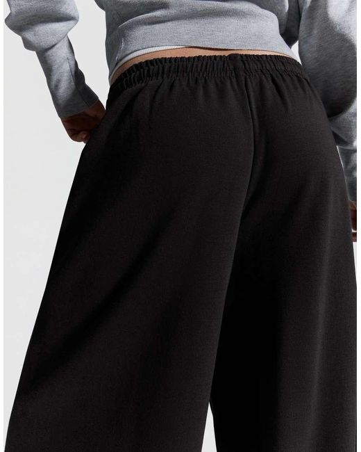 Bershka Black Petite Barrel Plush Trousers With Stoppers