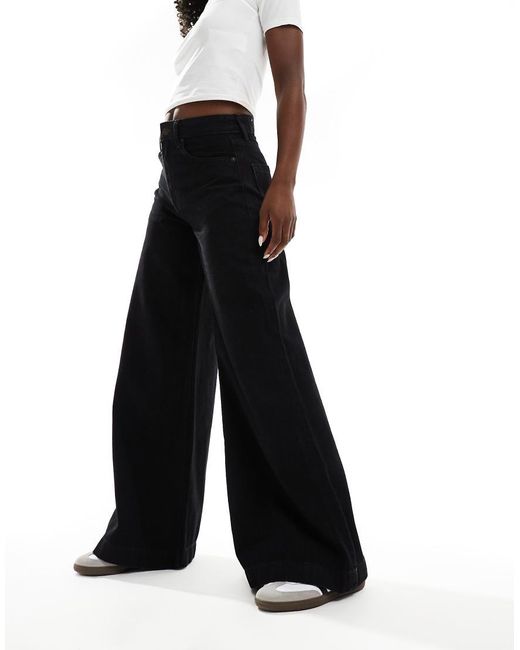 Stradivarius Flared Jeans Met Wijde Pijpen En Wassing in het Black