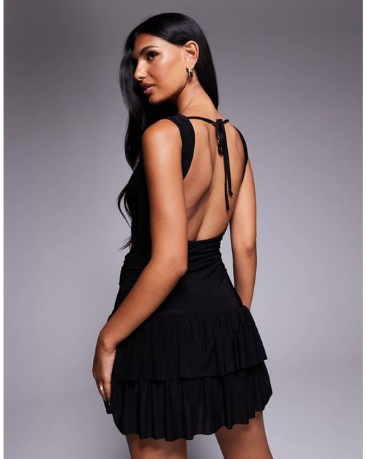 Fashionkilla Black Double-sculpted Slinky Slash Neck Low Back Ruffle Hem Flower Applique Mini Dress