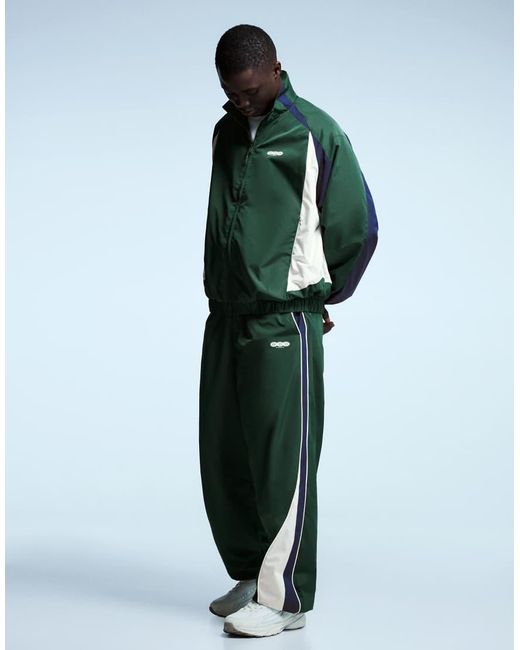 Bershka Green Super Baggy Technical Sports Trousers for men