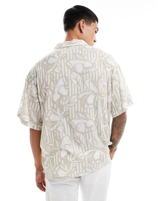ADPT White Oversized Revere Collar Shirt With Floral Print for men