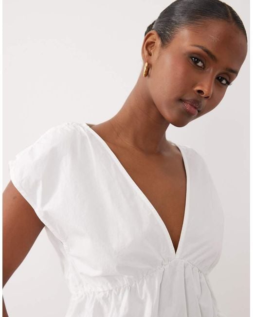 Gina Tricot White V-neck Peplum Sleeveless Blouse