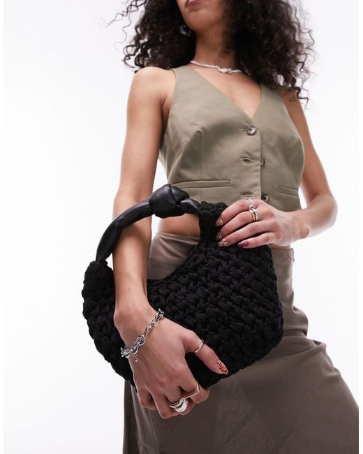 Gretel - borsa nera con manico con nodo e design intrecciato di TOPSHOP in Brown