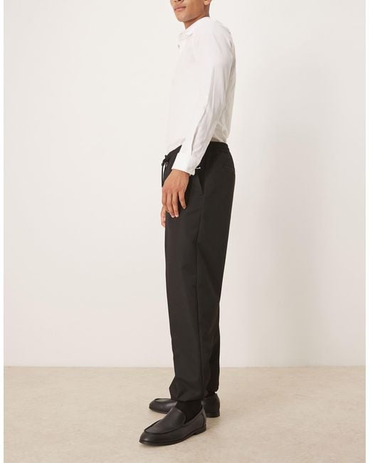 ASOS Black Tapered Fit Trouser With Elasticated Waist And Cuffs for men