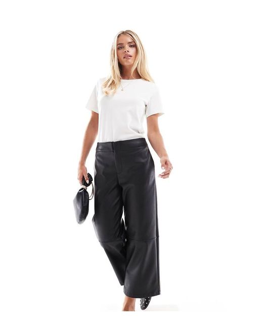 Pantalones Capri Negros De Cuero Sintetico De Asos Design Petite de ASOS de color Negro Lyst