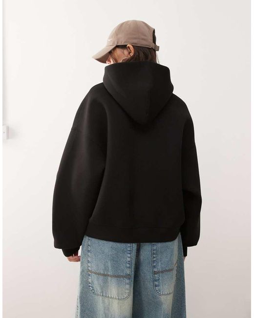 Sudadera Negra Extragrande Con Capucha De Tejido Efecto Neopreno De Weekday de color Black