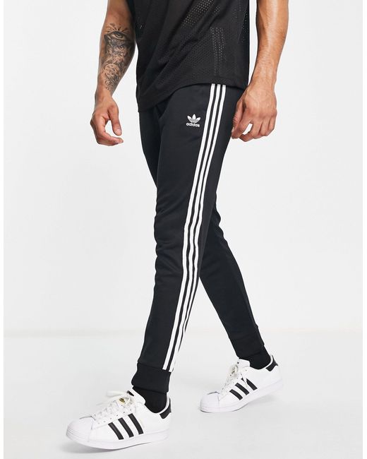 adidas Originals Adicolor Three Stripe Skinny Sweatpants in Black for Men |  Lyst UK
