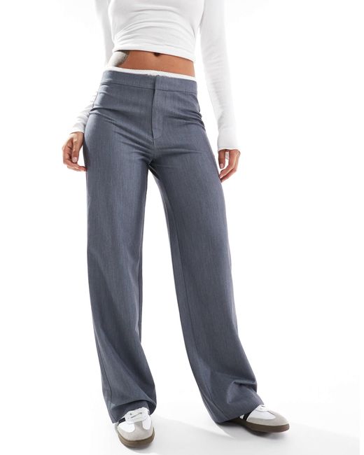 Pantalon ajusté avec taille en dentelle Stradivarius en coloris Blue