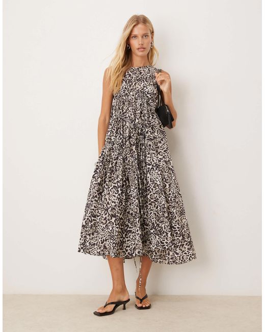 Robe longueur mollet à imprimé léopard avec cordons Ghospell en coloris Brown