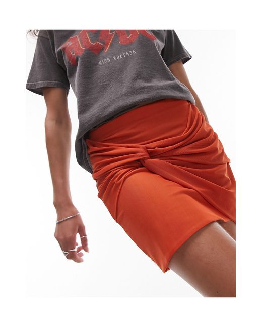Mini-jupe avec nœud sur le devant - rouille TOPSHOP en coloris Rouge | Lyst