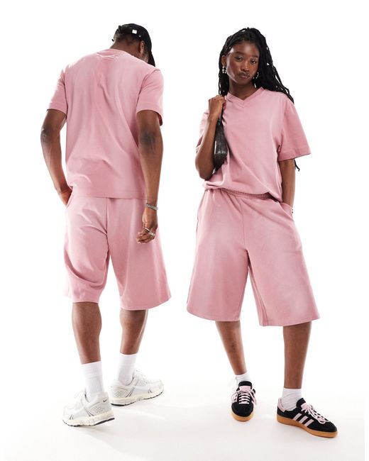 Unisex - t-shirt skate slavato con scollo a v di Collusion in Pink